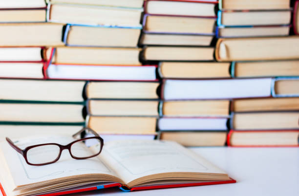 istock Many Books Piles, back to school background with copy space 1076633872
