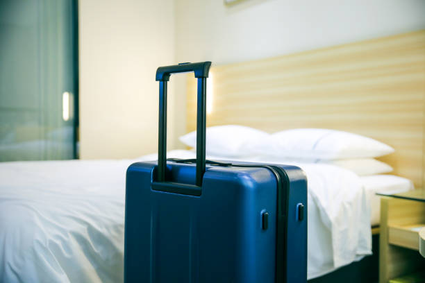 istock Suitcase In Hotel Room 1076634494