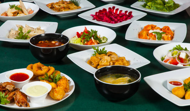 istock dishes with different food on the table. 1076637942
