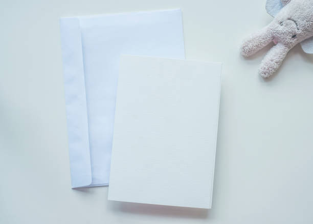istock White empty paper blank isolated for your design at white pattern with children toy flat lay mock up 1076638820