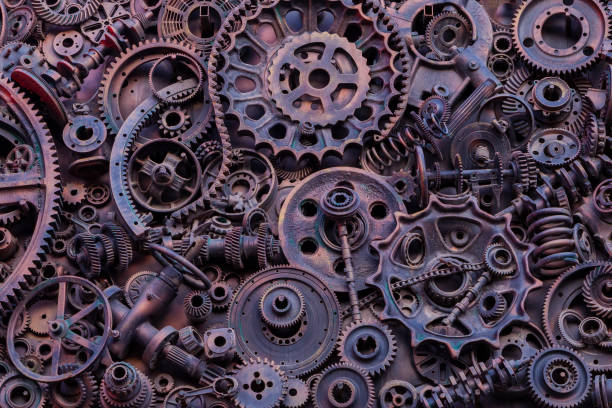 istock Steampunk background, machine parts, large gears and chains from machines and tractors. Old rusty machine and mechanical parts. Springs, bearings, pistons, crankshafts, camshafts. 1076641908