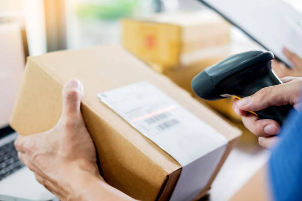 istock Midsection Of Person Scanning Box 1076642434