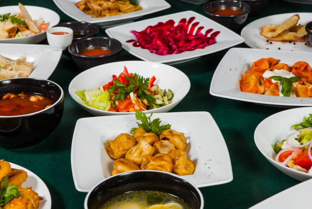 istock dishes with different food on the table. 1076643816
