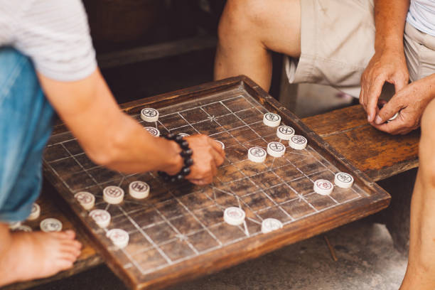 istock Midsection Of People Playing Leisure Game 1076645788