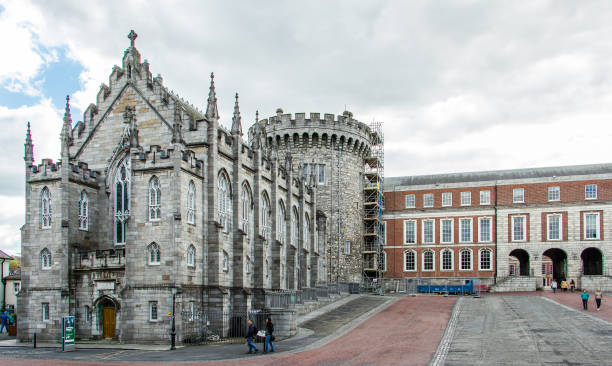 Dublin, Leinster, Ireland - May 13, 2018: gothic Chapel Royal and Record Tower buildings at Castle of Dublin east side. The chapel has hosted Anglican and Catholic cults before being deconsecrated.