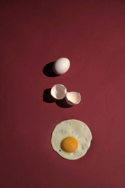 istock Scrambled eggs from a hen's egg in a frying pan. close up shot of a fried egg 1076658928