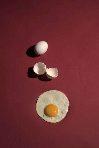 istock Scrambled eggs from a hen's egg in a frying pan. close up shot of a fried egg 1076658940