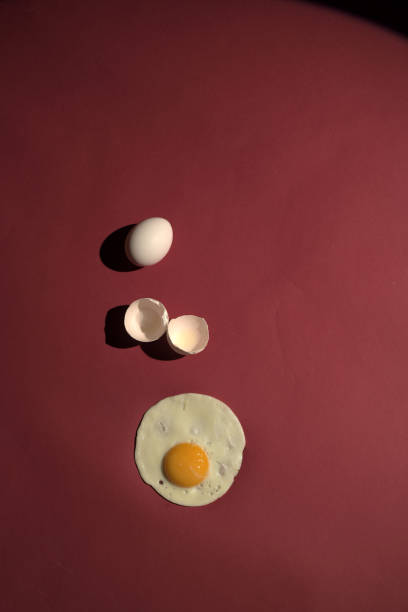 istock Scrambled eggs from a hen's egg in a frying pan. close up shot of a fried egg 1076658972