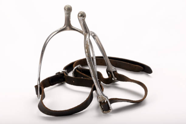 istock Old stirrups for horse riding isolated on a white background 1076662248