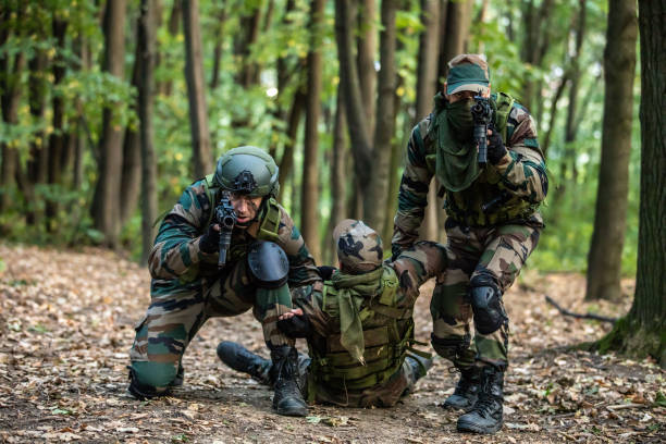 istock Military  Helping Injured Soldier 1076665386