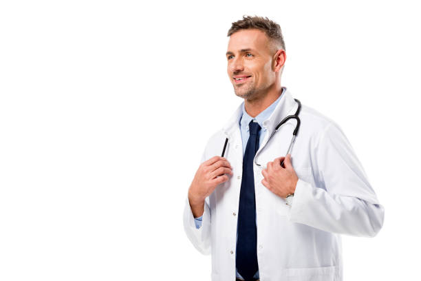 istock handsome doctor in white coat with stethoscope looking away isolated on white 1076666974