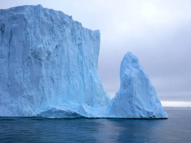 istock Arctic Icebergs on Arctic Ocean 1076672798