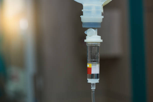istock iv fluid hanging in the patient room 1076679070