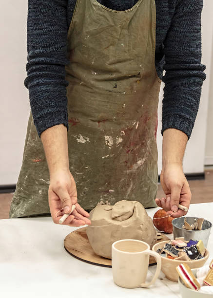istock Man making Ceramic dishes. Art Studio. School of Art. 1076689242