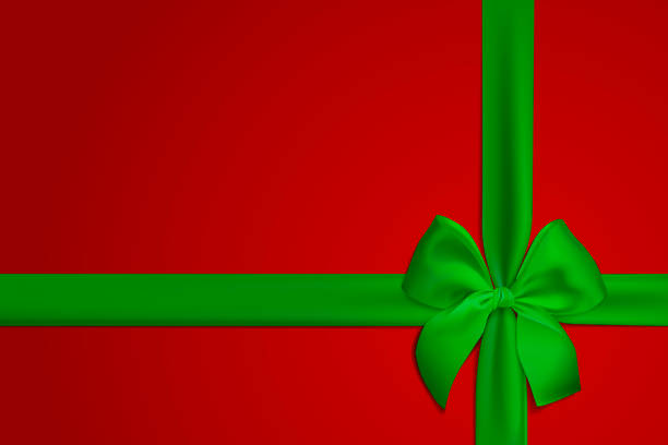 istock Realistic green bow and ribbon isolated on red background. Template for brochure or greeting card. Vector illustration. 1076691968