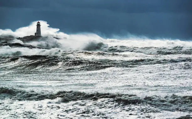 Heavy seas associated with a powerful Nor'Easter slams the coastline at Peggy's Cove Lighthouse.