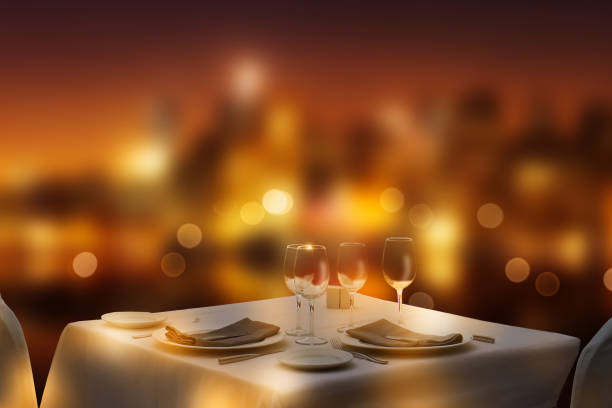 dining table in front of the city silhouette