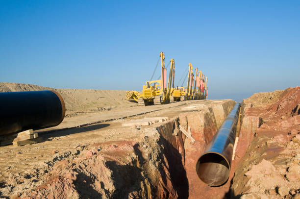 istock Crawler vehicles for transporting tubes of a pipeline 1076717270