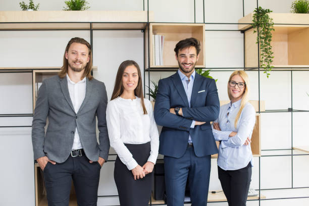 istock Group of smiling business people 1076721152