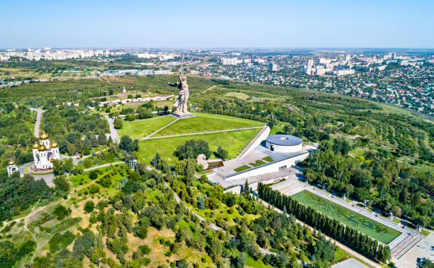 View of Mamayev Kurgan, a hill with a memorial complex commemorating the Battle of Stalingrad. Volgograd, Russia View of Mamayev Kurgan, a hill with a memorial complex commemorating the Battle of Stalingrad in World War II. Volgograd, Russia burial mound photos stock pictures, royalty-free photos & images