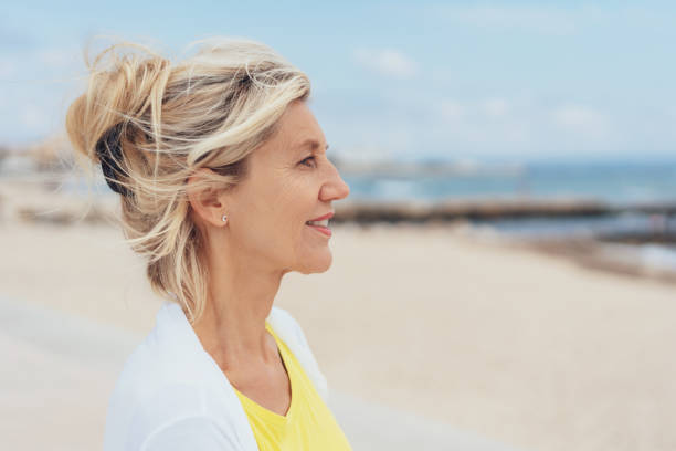 istock Attractive serious blond woman profile portrait 1076728438