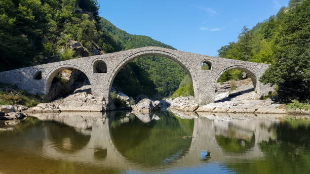 istock Landscape of medieval Devil's Bridge, Arda river and Rhodopes mountain, Bulgaria 1076728474