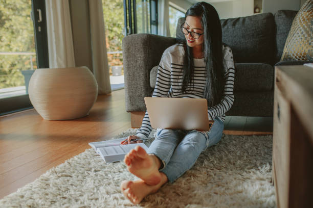 istock Female student studying at home 1076733566
