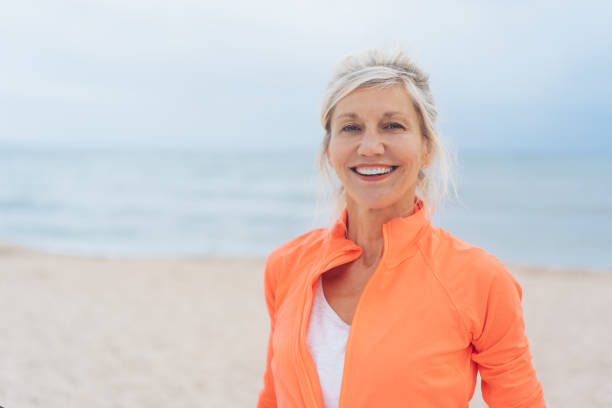 istock Attractive older blond woman with a beaming smile 1076733684