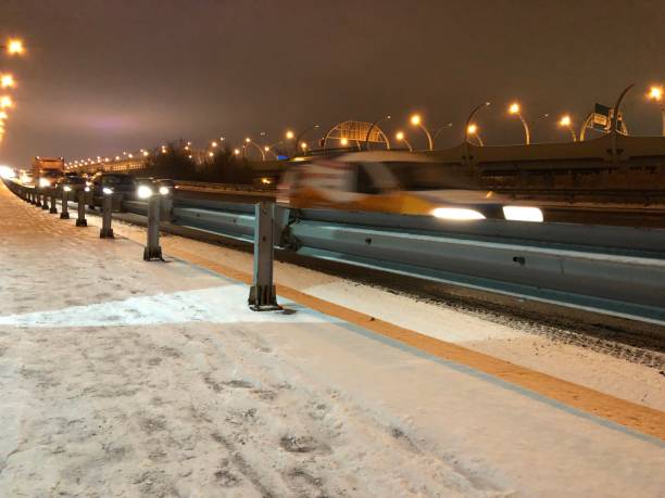 istock Highway,City,Road,Snow,Night 1076737314