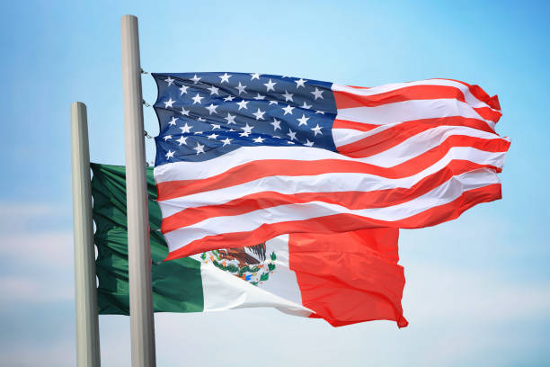 istock Flags of USA and Mexico 1076738352