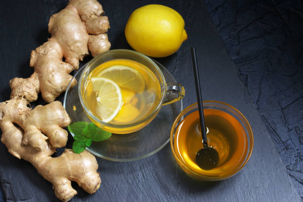 istock Ginger tea with lemon in glass cup 1076739084
