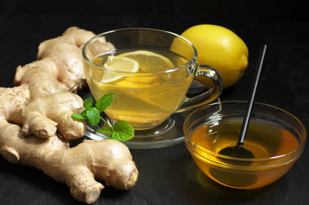 istock Ginger tea with lemon in glass cup 1076739114