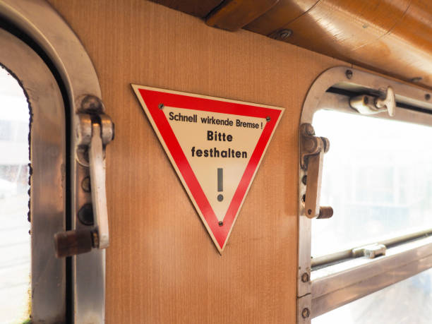 istock Quick-acting brake, please hold sign on German tram 1076740556