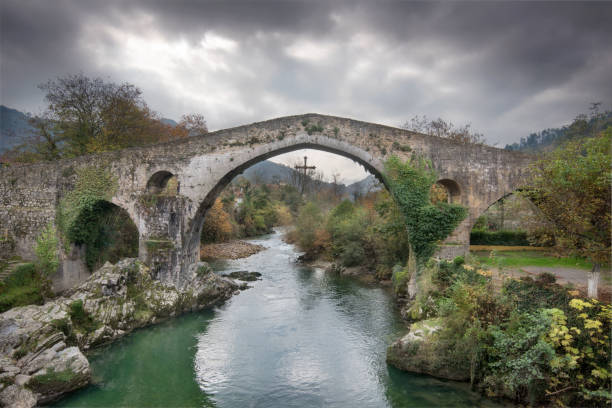 istock Ancient Roman bridge in Cangas de Onis, Asturias, Spain. 1076743310