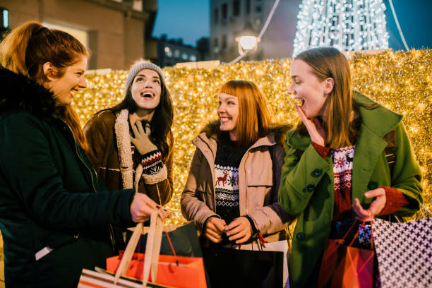 istock Smiling women after shopping 1076746388