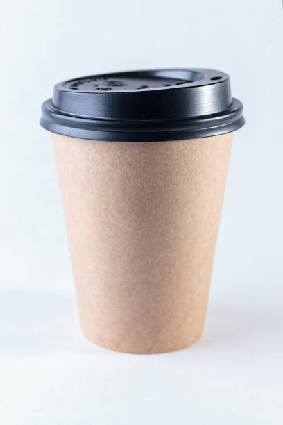 istock Blank take away kraft coffee cup isolated on white 1076748638