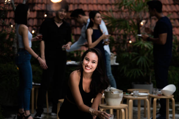 istock Young woman portrait at rooftop event. 1076751752
