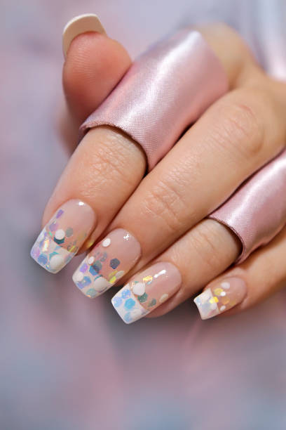 istock French wedding manicure with translucent glitters, white dots 1076756238