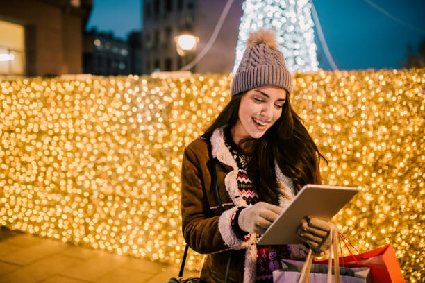istock Happy young woman with digital tablet 1076756406