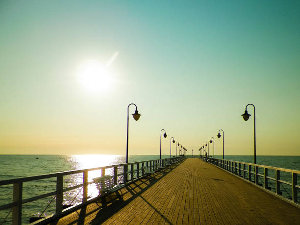 istock Sunrise over pier in Gdynia, Poland. 1076757544