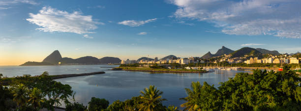 Beautiful panoramic view of the city of Rio de Janeiro with sugar loaf and corcovado at dawn. Aerial view of Rio de Janeiro skyline from Santos Dumont airport. corcovado stock pictures, royalty-free photos & images