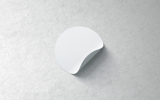 Maqueta de la etiqueta engomada adhesiva redonda blanca en blanco sobre fondo con textura photo