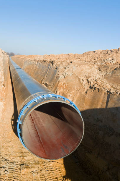 istock Pipeline construction - Natural gas pipeline in an excavated manhole 1076779942