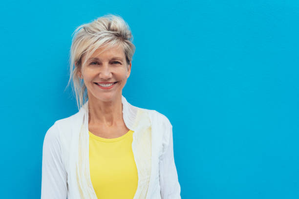 istock Happy vivacious older blond woman 1076785246