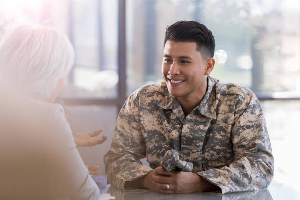 istock Solder talks with female counselor 1076785790