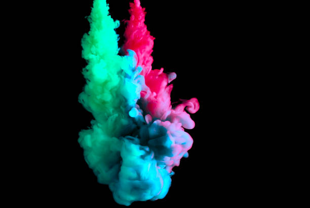 istock paint stream in water, colored cloud, abstract background, process of mixing multicolored dye on a black background 1076792348