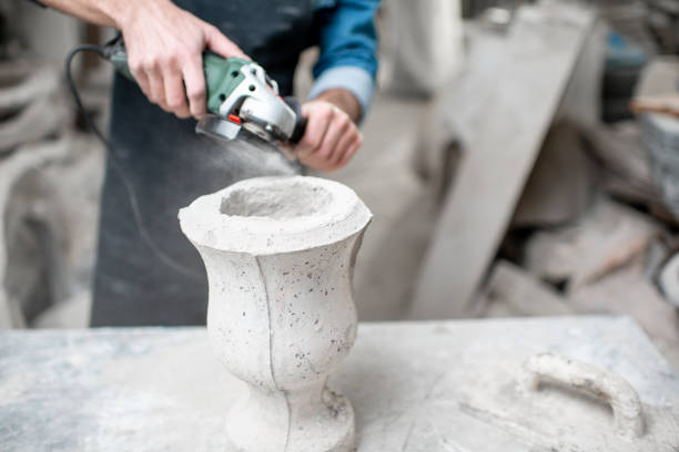 istock Sculptor working with sculptures in the studio 1076792874