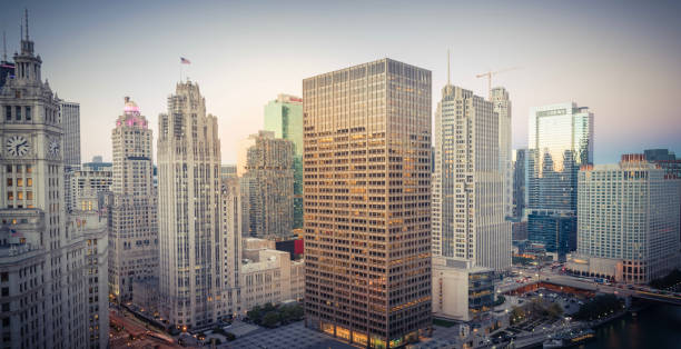 istock Filtered image of Chicago riverside skylines at sunset 1076799368