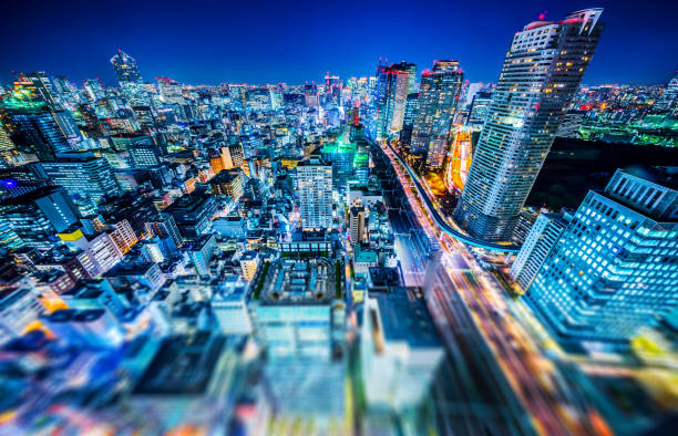 istock tokyo city night view & highway with tilt shift 1076802116
