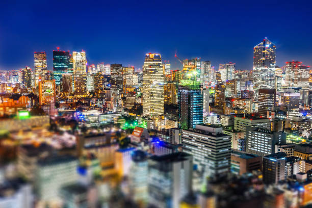 istock tokyo city night view & highway with tilt shift 1076802404